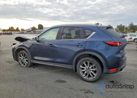 2021 Mazda Cx-5 Signature z USA, uszkodzony, nr VIN JM3KFBEY0M0423806